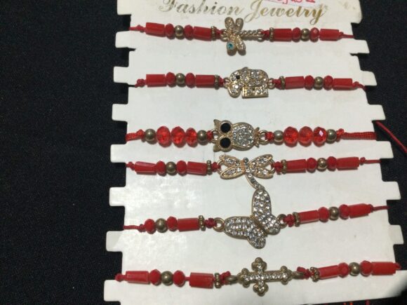VN64 PULSERAS ROJAS DE DIFERENTES MODELOS