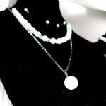 Collar triple de perlas