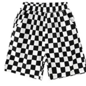 SP422 pantalones tipo short cortos informales a cuadros con bolsillos a los lados y en la parte de atrás.