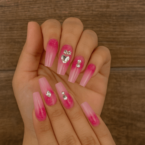 VN405 Uñas largas rosadas de flores y pepitas